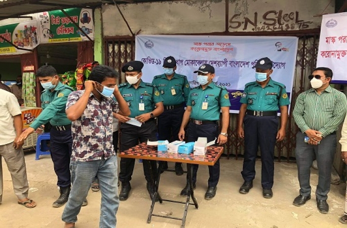 করোনা মোকাবিলায় কর্ণফুলীতে  মাস্ক বিতরণ কর্মসূচি