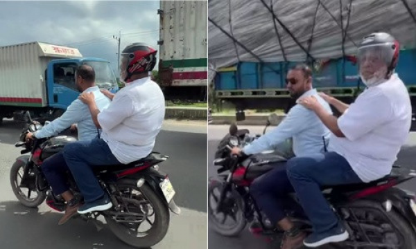 যানজটে আটকা গাড়ি, বাধ্য হয়ে মোটরসাইকেলে চড়লেন সড়ক উপদেষ্টা