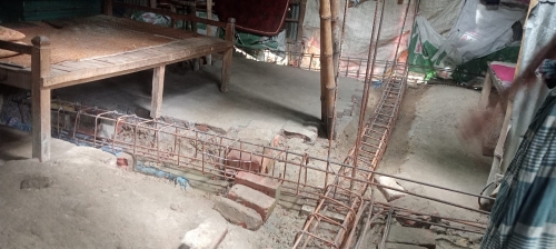 কালাইয়ে খাস জমিতে টিনের বাড়ির আড়ালে পাকাবাড়ি নির্মান