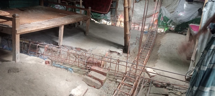 কালাইয়ে খাস জমিতে টিনের বাড়ির আড়ালে পাকাবাড়ি নির্মান